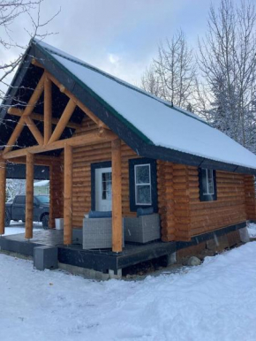 Lofted log cabin with fire table